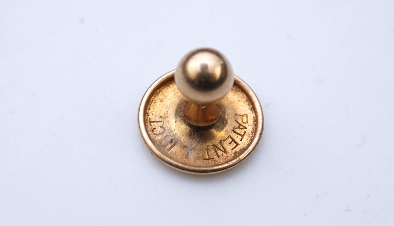 A collection of cufflinks and dress studs